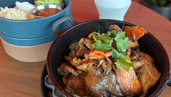 Noche Woodfired Grill and Agave Bar signature dishes Marinated Chicken FajitasMarinated New York Strip FajitasTetelas